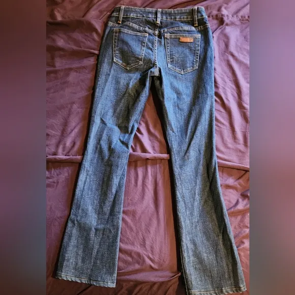 3 pair total: 2 Joe's jeans and 1 J brand jean size 25 and 24