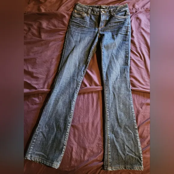 3 pair total: 2 Joe's jeans and 1 J brand jean size 25 and 24