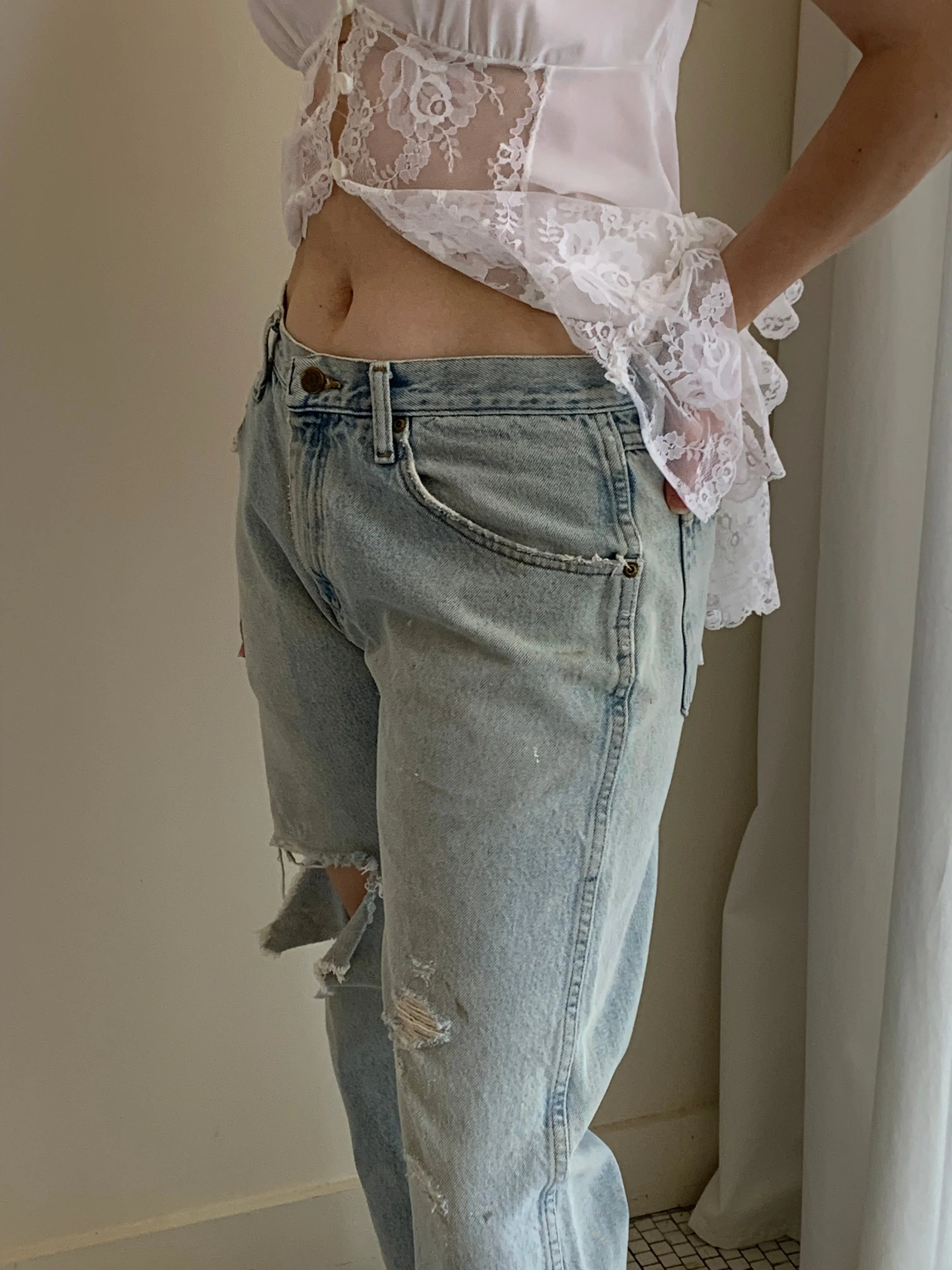 90s distressed Wrangler jeans