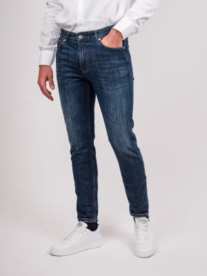 Jeans cinque tasche effetto sabbiato