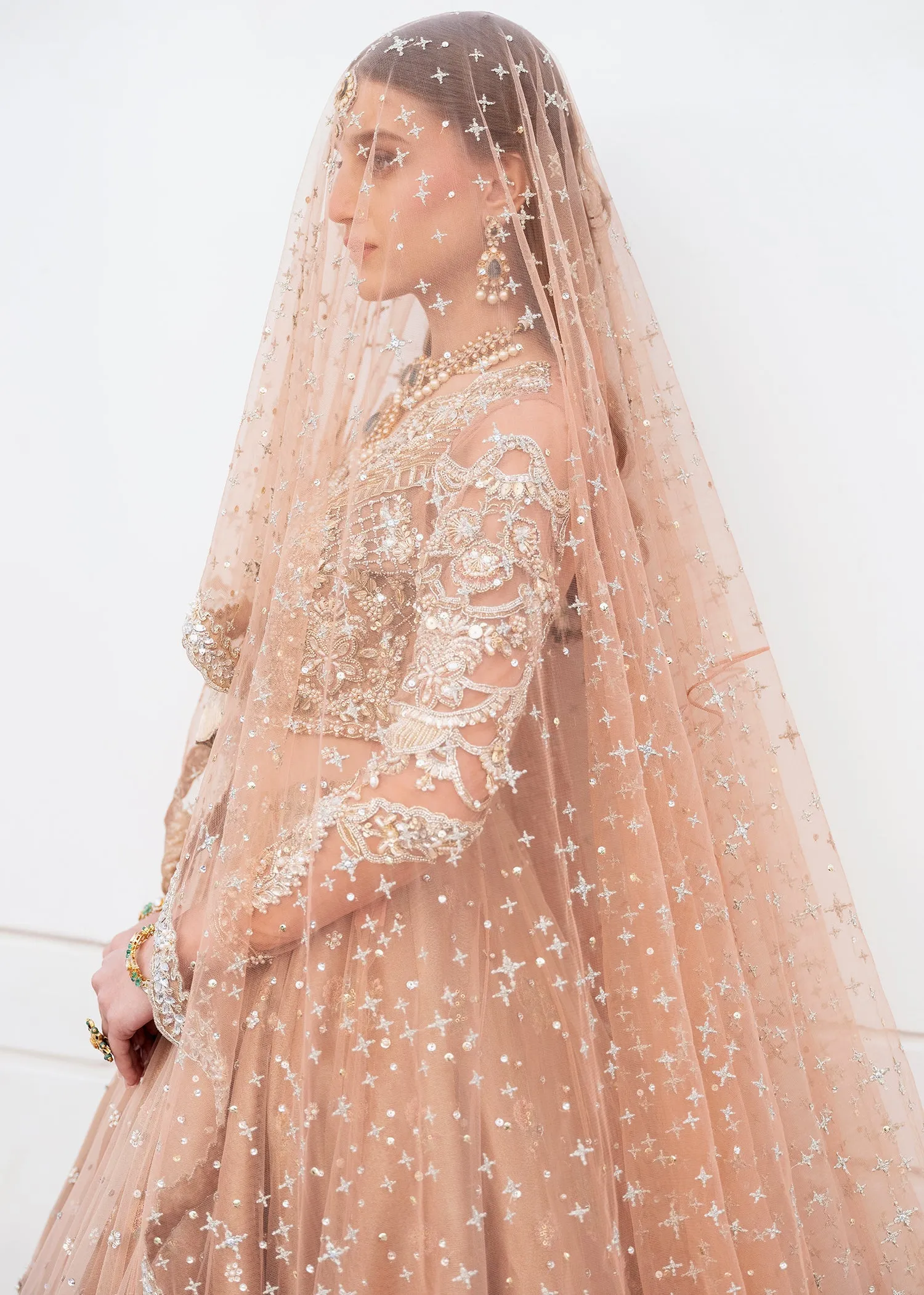 Pakistani Gown and Bridal Lehenga with Heavy Embroidery