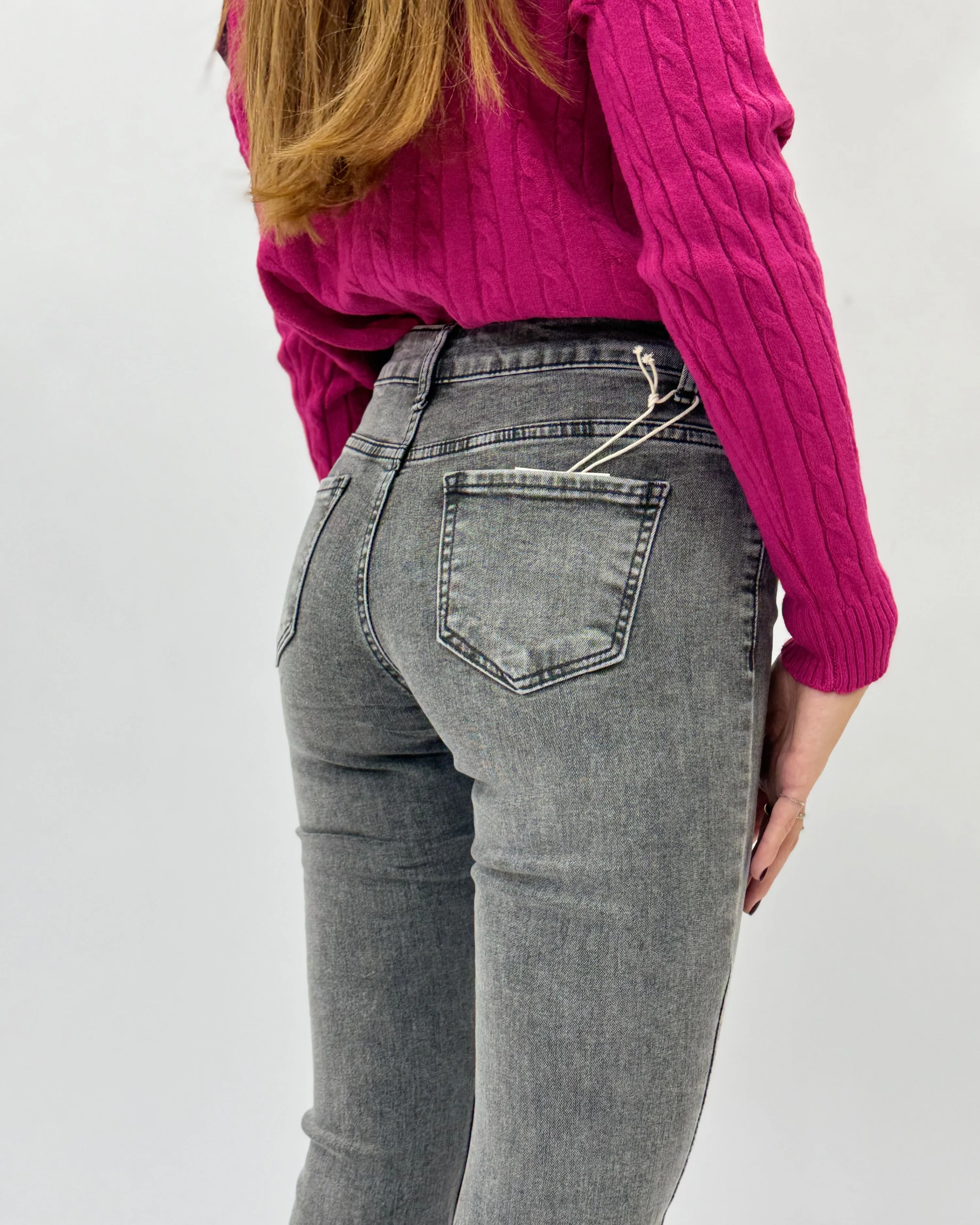 Pantaloni jeans vita alta a zampa