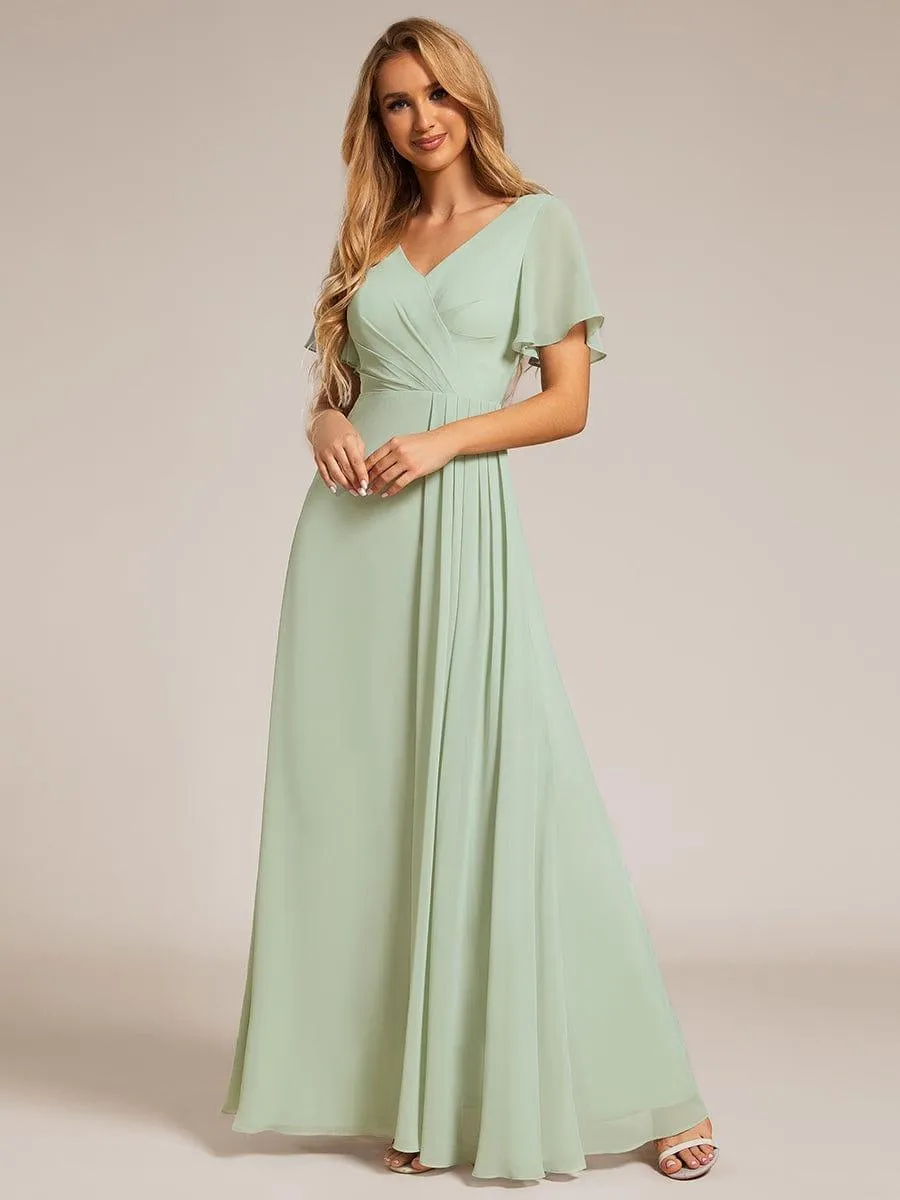 Robe de demoiselle d'honneur taille haute en mousseline de soie col en V fente haute manches à volants