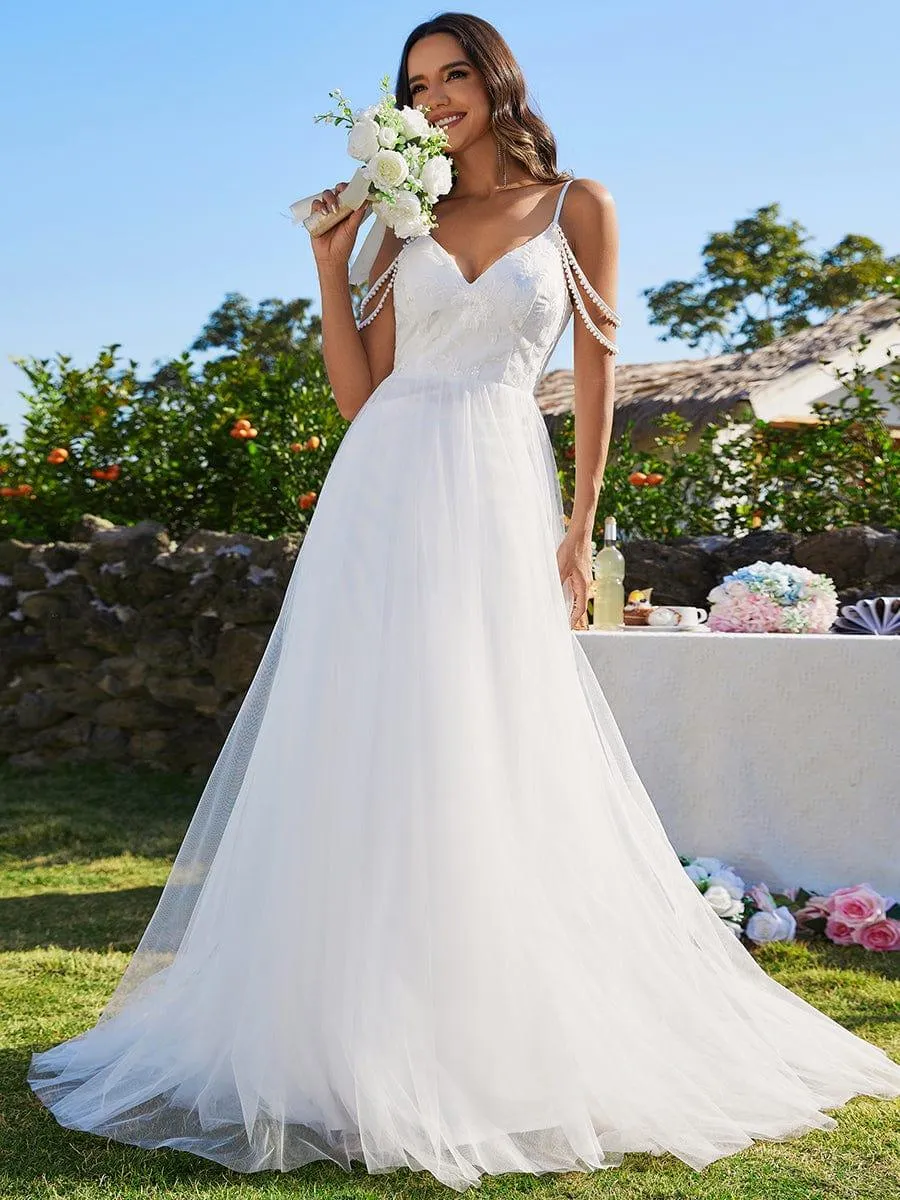 Robe de mariée brodée à col en V et bretelles perlées avec ligne A