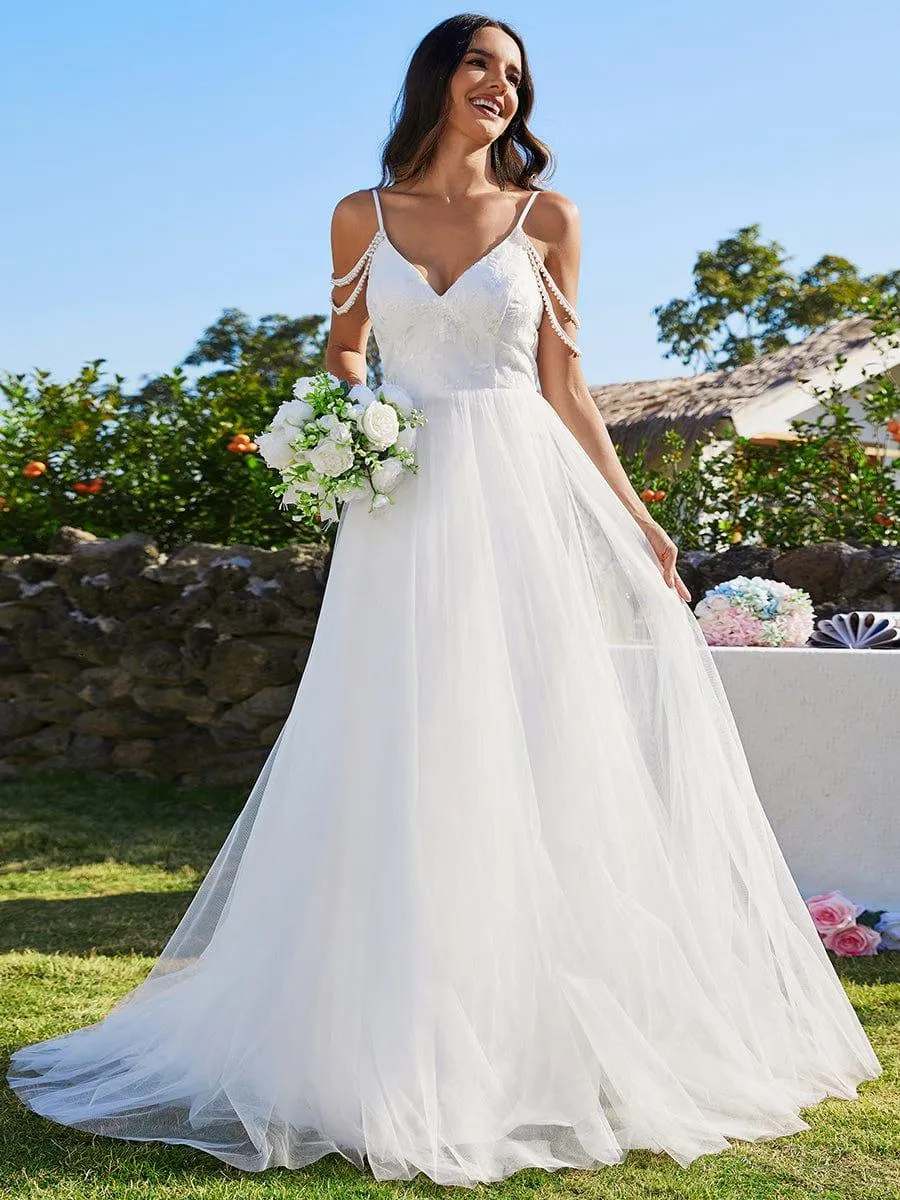 Robe de mariée brodée à col en V et bretelles perlées avec ligne A