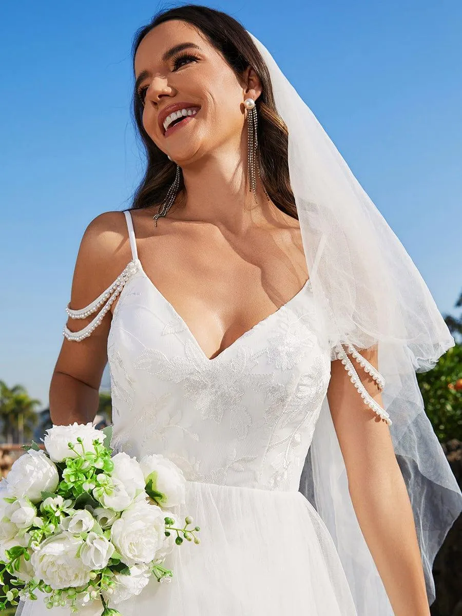 Robe de mariée brodée à col en V et bretelles perlées avec ligne A