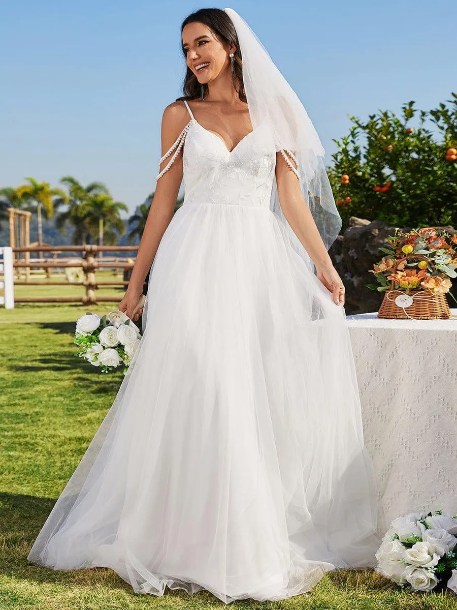 Robe de mariée brodée à col en V et bretelles perlées avec ligne A
