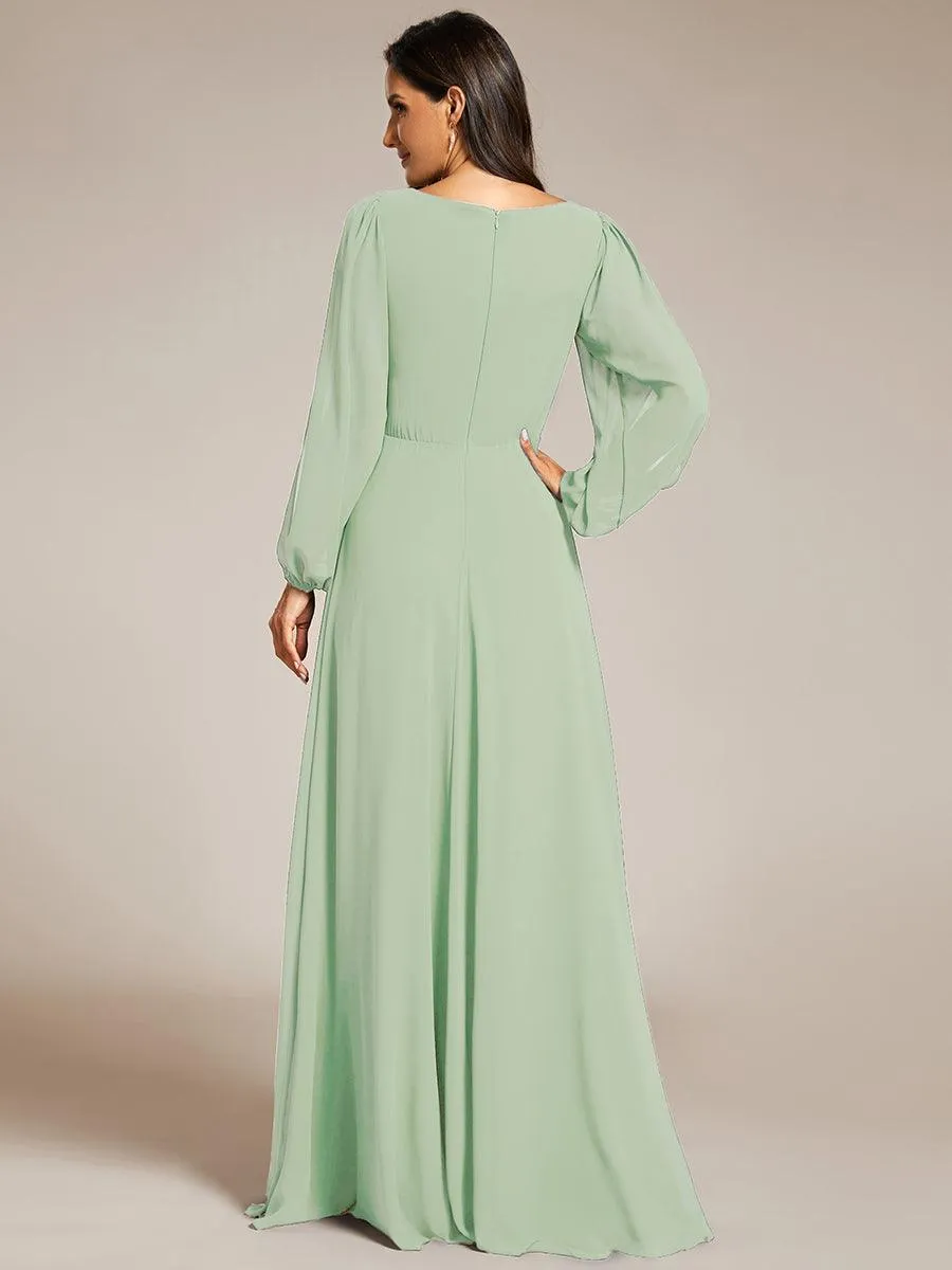 Robe de soirée longue et élégante avec manches lanternes